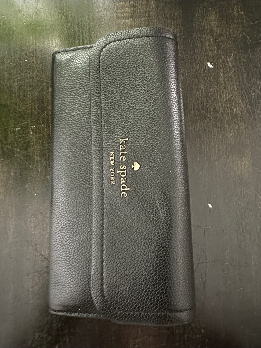 kate spade Black Pebbled Leather Continental Wallet with Gold Logo